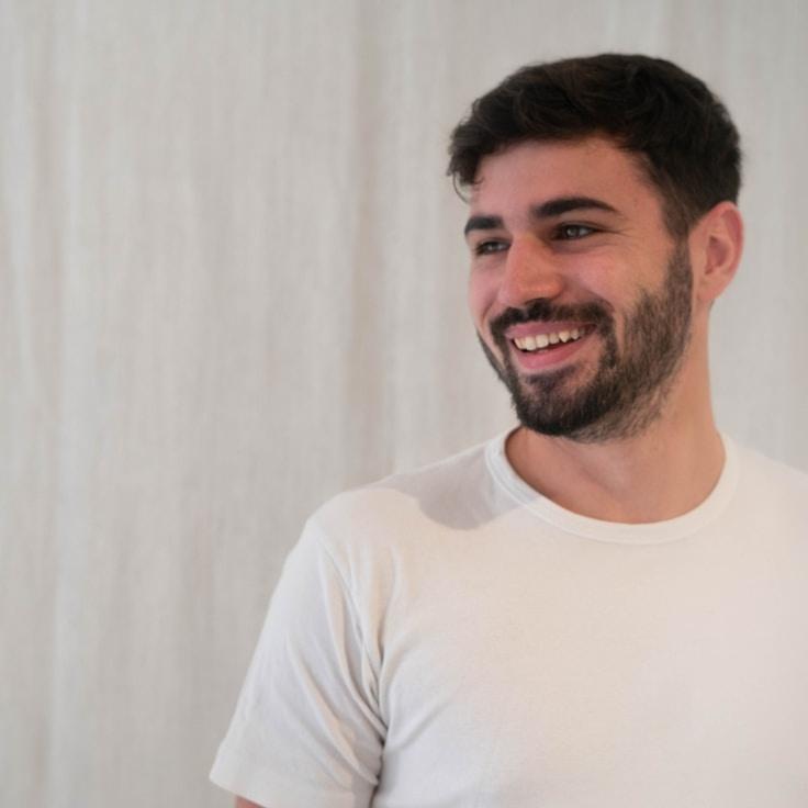 Kaveri Mehta, Lead Design Curator at Perchan Chor Cove, reviewing corporate floral arrangements